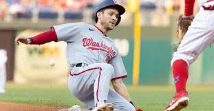 Washington nationals starting pitcher max scherzer (31) is congratulated by shortstop trea turner (7) after the game against the miami marlins. Washington Nationals Trea Turner Pulled From Game After Testing Positive For Covid 19