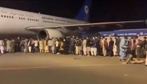 Desperate afghans clung to the side of a moving us military plane leaving kabul airport today, with at least three people apparently falling to their deaths from the undercarriage immediately. C4c2cn2lxmtlvm