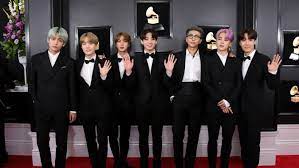 After walking the red carpet and inspiring us to embrace a wardrobe of just overcoats, the group took. Bts 2019 Grammy Suits On Display At Grammy Museum Grammy Com