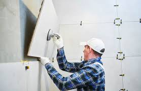 Outre son aspect décoratif, il assure une parfaite protection contre les projections. Comment Choisir Et Poser Du Carrelage Grand Format