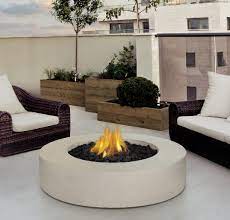 Choosing Between An Outdoor Fireplace And An Outdoor Fire Pit Round Propane Fire Pit Backyard Fire Fire Pit Table