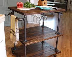 An industrial design is innovative with bright lighting and a clever kitchen island. Industrial Kitchen Island Etsy