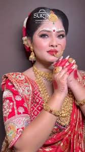 Draped in her vibrant saree, the Bengali bride dances with pure joy, her  laughter echoing like music in the air. With every twirl, her grace shines  brighter, celebrating love, tradition, and the ...