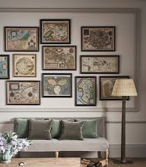 How To Hang A Painting Perfectly Oka Blog In 2020 Living Room Decor Tips Living Room Decor Globe Decor