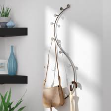The next range of shoe racks online queued by wooden street includes those featuring the benefits of doors in front. Wall Mounted Hanging Rack Ideas On Foter