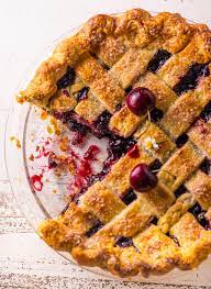 Trim the excess dough around the edges and crimp the top and bottom crusts together to seal them. Foolproof Cherry Pie The Best Cherry Pie Recipe From Scratch