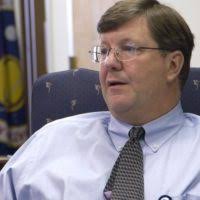 Official portrait of George Tomchick, Deputy Assistant Secretary for  Finance and Budget, Federal Housing Administration