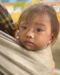 300 children in the highlands of Vietnam. 100 families in the local area.  We had the opportunity to hang out in a warm rain.