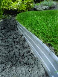 Recycled rubber looks pretty much like mulch and can be used to create borders in your lawn. Garden Edging Products
