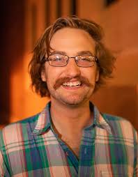 Josh Gibson has been performing for years in bars, basements, hotels and  under the unforgiving gaze of a nursing home director. His comedy will make  you think but not like too much