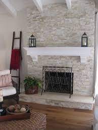 And showcasing stunning flame effects, this electric fireplace is sure to create a welcoming environment. 15 White Stone Fireplaces Ideas Fireplace Design Fireplace Remodel Fireplace Makeover