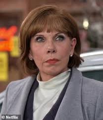 Dolly Parton is a modern day angel in the festive trailer for Christmas