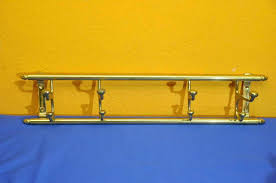 Maybe you would like to learn more about one of these? Wall Coat Rack Hook Bar With Folding Hook Brass 1960s Kusera