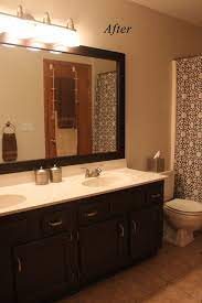 I have painted oak trim white many times for clients and my own home, which had the original dark trim throughout. Bathroom Vanity Updated From Honey Oak Painting Bathroom Cabinets Bathroom Cabinet Colors Oak Bathroom Cabinets