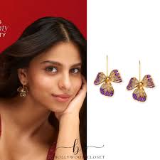 SuhanaKhan for Tira Beauty ad. Suhana is wearing @diyarajvvir Marsala Res  Embroidered Crop Top-Skirt Set (₹72,500) and @azgaofficial Tiny Fiore  Earrings (₹2,650). Styled by : @lakshmilehr @gaurvivdesai