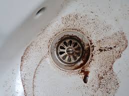 why does my kitchen sink smell like sewage?