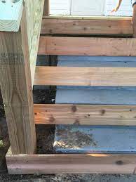 If the concrete steps were painted, you should first remove cracked or peeled paint with a grinder or how to attach runners on concrete stairs. How To Cover Concrete Steps With Wood Farmhouse On Boone