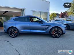 Image result for Concours Blue 2017 Aston Martin