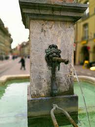 18 Things That Your Average Swiss Takes For Granted Switzerland Travel Fountain Fountains