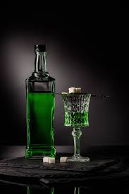 Oil on linen canvas packing: Close Up Shot Of Glass And Bottle Of Absinthe With Spoon And Sugar Cubes On Dark Background Royalty Free Photo And Stock Image