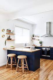Every featured kitchen is beautiful. Global Wanderer Adore Home Magazine Wood Countertops Kitchen Kitchen Design Small Modern Kitchen Design