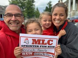 Pastor Mark and Mollie Henrich, along with Essie and Evangelina, walked for  Mollie's mom, Pat Stern. They are from Hope Lutheran in Toronto.