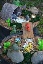 dinosaur garden with bridge ramp in 2020 dinosaur garden gardening for kids fairy garden