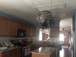 Check out the video of recessed lights to see how to upgrade your. How To Update Hideous Fluorescent Lighting In Kitchen