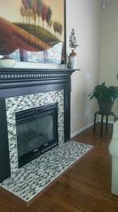 Black And White Tile Fireplace Surround My Diy Tile Fireplace Surround No Before Pic But It Was Builder Grade White And Black Marble It Wa Fireplace Surrounds Fireplace Tile Fireplace Tile Surround