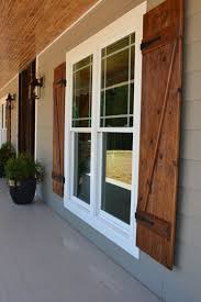 Front Porch With Custom Ceiling Cedar Posts Stone Columns And Wood Shutters House Exterior Modern Farmhouse Exterior House Design