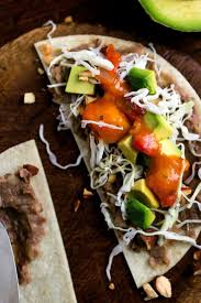 Tostadas With Beans Cabbage And Avocado Recipe Avocado Recipes Plant Based Eating Cabbage