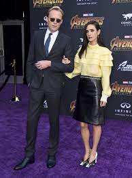 Infinity war premiere in los angeles 04/23/2018, jennifer connelly style, outfits, clothes and latest photos. Paul Bettany Jennifer Connelly Pose On The Purple Carpet At The World Premiere Of Avengers Infinity War Photos At Movie N Co
