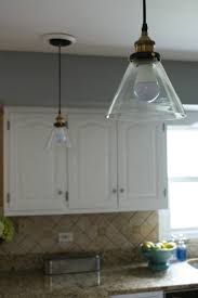 Start with the recessed and detailed areas first. Our Hopeful Home Diy White Modern Farmhouse Painted Kitchen Cabinets