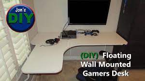Cut a scrap piece and attach it to the centre of the front of the desk to create a lock. Floating Wall Mounted Corner Desk Jon S Diy Youtube