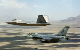 Info about f 16 fighting falcon : An F A 22 Raptor And An F 16 Fighting Falcon Fly In A Fingertip Formation On A Training Mission