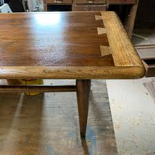 The smaller table turns into and underneath the larger table on a woodblock swivel. How To Restore A Mid Century Modern Coffee Table Revival Woodworks