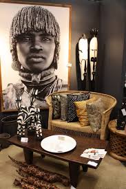 Contemporary living room with a fabulous display and a moroccan rug. Pin On African Decor Ideas