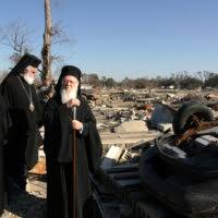 U.S. Navy Chaplain Lt. Michael Hendrickson helps clean up the Greek  Orthodox Church of New Orleans after Hurricane Katrina.