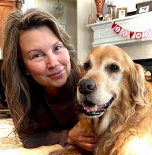 Adopted a honey-colored dog named Buzz near NASA