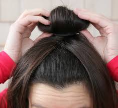 Roll up the sock so that it is donut or ring shaped, and slip it over the ponytail. Sleek High Sock Bun Tutorial Diary Of A Debutante