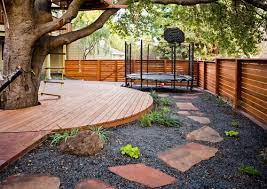 What to put under trampoline. 32 Fun Backyard Trampoline Ideas Home Stratosphere