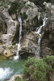visit greece kourtaliotiko gorge on crete its slopes are full of caves and springs when the wind blows you can hear clap visiting greece crete greece crete