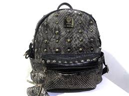 However popular the classic heritage line may be, mcm reinvents itself time and again and surprises every season with unusual designs and. Super Sale Authentic Mcm Snakeskin Backpack Luxury Bags Wallets On Carousell