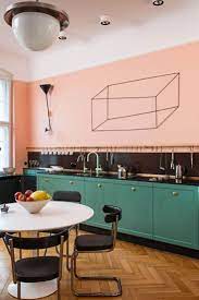 Kuche Mit Bauhaus Mobeln Einrichten Stahlrohr Freischwinger Wandfarben Farbkombination Rosa Schwarze Fliesen Kucheneinrichtung Kuchentrends Kuche Beige