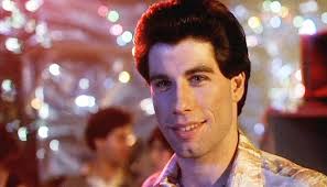 John travolta has been reborn to hand jive. John Travolta During The Premier Of Saturday Night Fever 1977 Bygonely