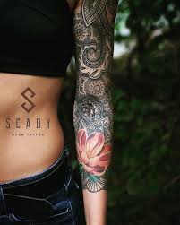 Black And Grey Flower Tattoos With Color Mandala And Flower Tattoo Too Much Background Prefer More Open Skin I Love The Mix Of Color And Blac Tattoos Sleeve Tattoos For Women Mandala Tattoo Sleeve