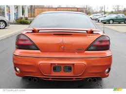 Image result for Sunburst Orange 2004 Pontiac