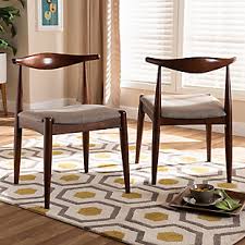 Maybe you would like to learn more about one of these? Aeron Mid Century Modern Light Gray Fabric Upholstered Walnut Finished Wood Dining Chair Set Ashley Furniture Homestore