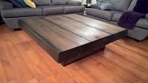 Generally the rule is that your coffee table should be the same height as your couch's seat (give or take one to two inches, but not any lower). A Massive Coffee Table Made From Reclaimed Spruce Barn Beams The Top Is Constructed From Three 5 Thick X 16 Wid Custom Coffee Table Coffee Table Barn Beams