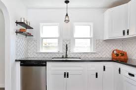 I went with a mid grey for the pantry doors, window sills and the outer frame, with white on the inner frame. Black Handle White Cabinets Houzz